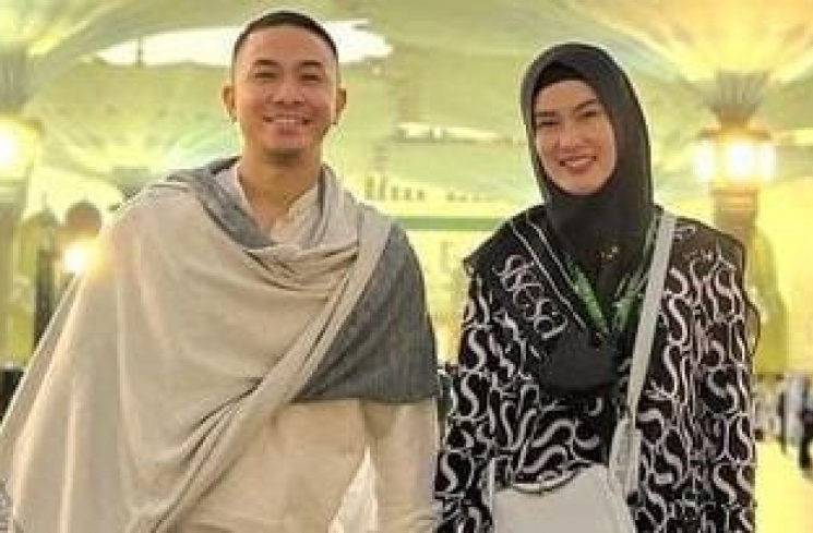 Almarhumah Stevie Agnecya bersama sang suami, Anggi Pratama [Instagram/@steviagnecya]