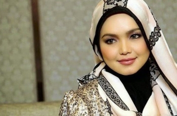 Sepakat Disembunyikan, Foto Wajah Anak Siti Nurhaliza Malah Tersebar