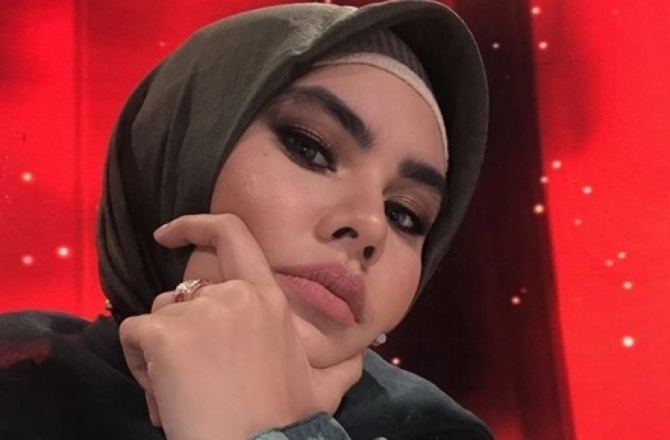 Artis Kartika Putri bercadar. [Instagram]