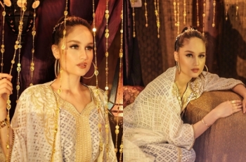 Sering Pakai Baju Terbuka, Anggunnya Potret Cinta Laura Pakai Kerudung