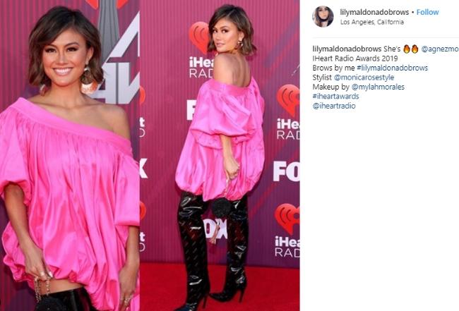 Agnez Mo saat hadiri acara iHeart Radio Music Awards 2019. (Instagram/@lilymaldonadobrows)