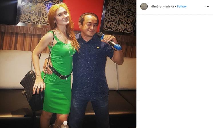 Revi Mariska dan suami (Instagram/@dhe2re_mariska)