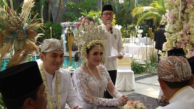 Pernikahan Ichal Muhammad dan Dafina Jamasir. [Suara.com/Evi Ariska]