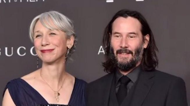 Keanu Reeves dan Alexandra Grant. (Youtube/Accsess)