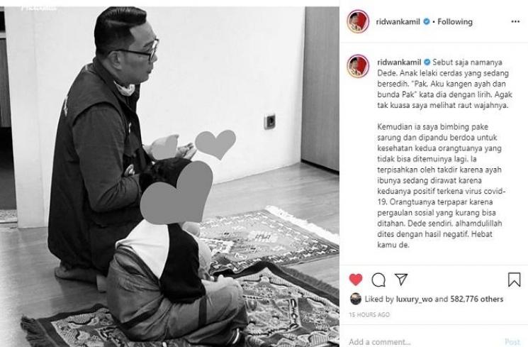 Ridwan Kamil bersama seorang anak kecil yang terpisah dari orangtuanya karena corona (Instagram @ridwankamil)