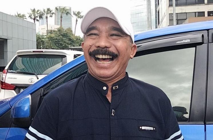 Komedian Opie Kumis saat ditemui di Kawasan Tendean, Jakarta Selatan, Kamis (28/1/2021). [Matamata.com/Alfian Winanto]