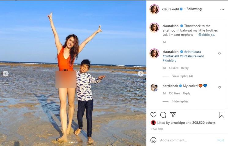 Cinta Laura main ke pantai bareng keponakan. (Instagram/claurakiehl)
