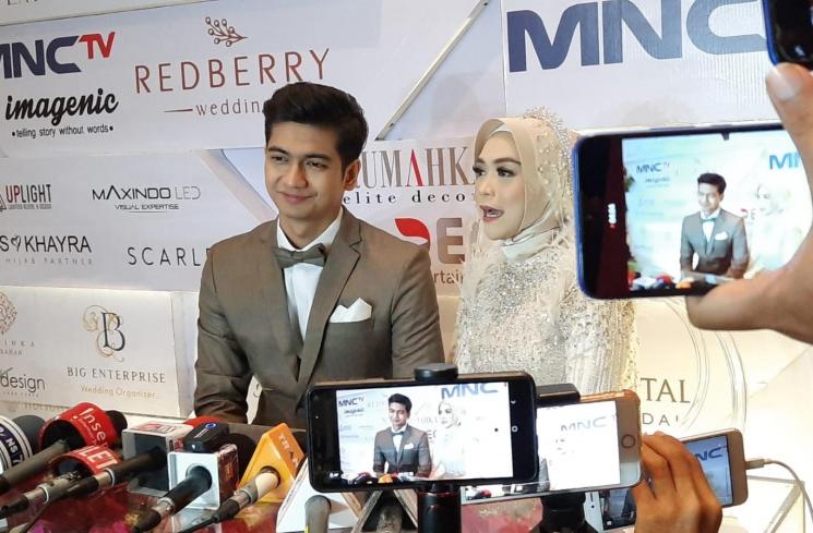 Ria Ricis dan Teuku Ryan. (MataMata.com/Ismail)