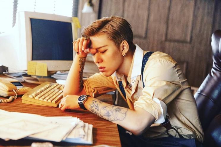 Seleb Korea yang Punya Tato Tersembunyi (Instagram/@woozico0914)
