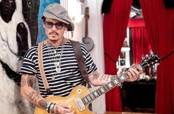 Johnny Depp Menang di Kasus Pencemaran Nama Baik, Amber Heard Tertunduk Lemas