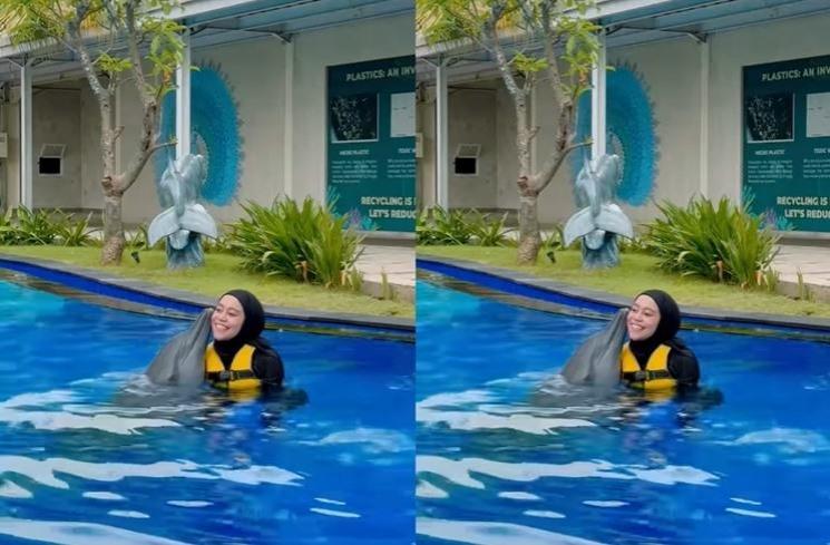 Potret Lesti dan Billar main bareng lumba-lumba. (Instagram/@lestykejora)