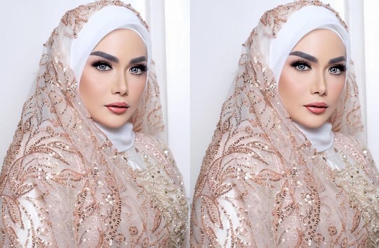 Potret Krisdayanti Berhijab saat Manggung (Instagram/@dhirmanputra)