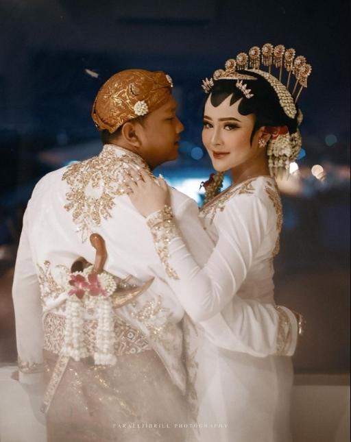 Potret Akad Nikah Denny Caknan dan Bella Bonita.