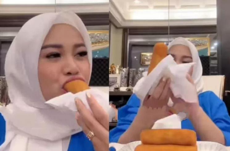 Aurel Hermansyah lahap risol ke mulut. (Instagram @lambegosiip)