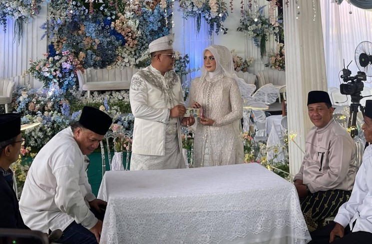 Pernikahan Andrigo Indra Kurniawan dan Tengku Titin Indrasari. (ist)